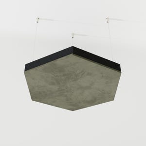 May include: A hanging, geometric sound panel with a gray, textured surface and a black border. The panel is suspended from the ceiling by thin white cables, creating a modern, minimalist aesthetic. The panel's shape is a truncated hexagon.