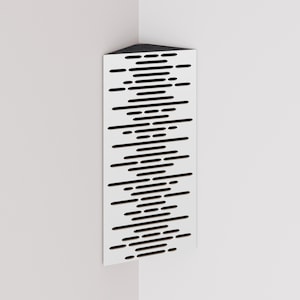 May include: A white, triangular corner wall panel with a black, geometric design. The panel features a series of horizontal black lines of varying lengths, creating a pattern. The top of the panel is black.