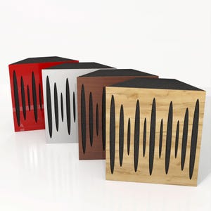 May include: Four acoustic panels in red, white, brown, and light wood grain. Each panel has a black top and a series of vertical, elongated cutouts revealing a black interior. The panels are designed to absorb sound.