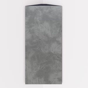 May include: A gray corner shelf with a textured, mottled surface. The shelf is rectangular with a dark gray top and is mounted in a corner against a white wall.