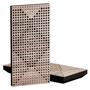 May include: Wooden acoustic panels with a light wood grain finish and a pattern of varying sized black holes. The panels have a black border and are designed to absorb sound. One panel is upright, and another is lying flat.
