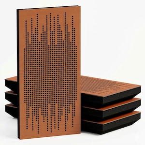 May include: A stack of rectangular acoustic panels featuring a light brown wood grain finish on the front surface. Each panel is perforated with a dense pattern of small black circular holes and has a thick black foam backing layer.