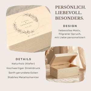 May include: A light-colored wooden box with a hinged lid, featuring a circular floral design with names and a date. The box is open in the lower right corner, revealing the interior. Text on the box includes "PERS&Ouml;NLICH. LIEBEVOLL. BESONDERS."