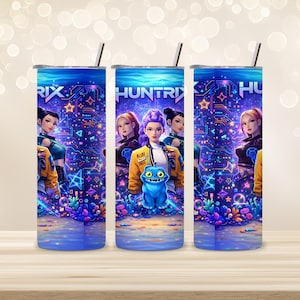 May include: Three stainless steel tumblers with the word "HUNTRIX" and a futuristic design. Each tumbler features a vibrant illustration of anime-style characters in a digital cityscape with a blue creature.