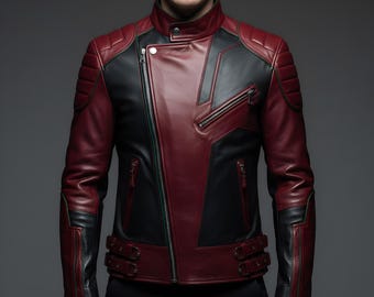 May include: A two-tone leather jacket in burgundy and black. The jacket features a stand-up collar, an asymmetrical zipper, and quilted shoulder detailing. The sleeves have zippered cuffs and buckle accents at the waist. A stylish outerwear piece.