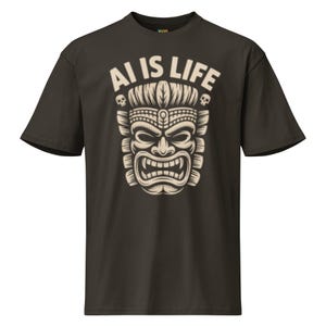 Può includere: Un set di tre tazze in ceramica con finitura opaca e macchiettata. Le tazze sono nei toni del crema, grigio chiaro e grigio scuro. Ogni tazza ha un design semplice e minimalista.