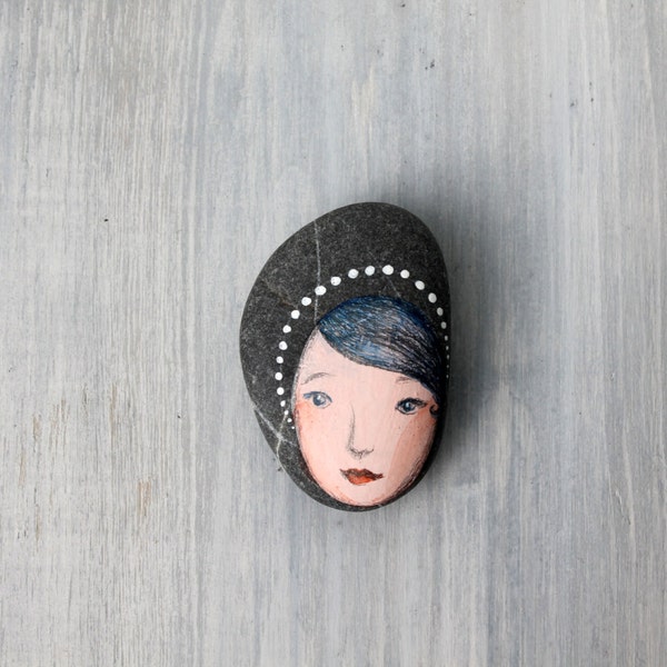Painted stone. painted pebble. Beach pebbles art