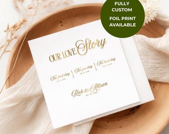May include: A square white card featuring gold foil text that reads Our Love Story, The first day 02-14-2024, The yes day 08-18-2025, The best day 05-29-2027, and Rick & Allison 05-29-2027. A green circular badge states FULLY CUSTOM FOIL PRINT AVAILABLE.