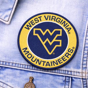 May include: A handmade wooden sign with the text "Welcome to our home" in a handwritten style. The sign is painted white with black lettering and a distressed finish, perfect for home decor.