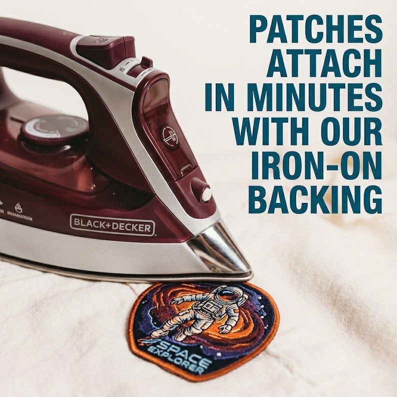 May include: A maroon and silver Black+Decker iron positioned above a circular embroidered patch featuring an astronaut in space with the text SPACE EXPLORER. The image includes the text PATCHES ATTACH IN MINUTES WITH OUR IRON-ON BACKING.