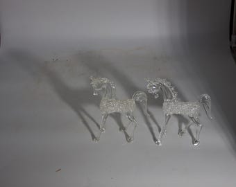 Par original de caballos de joyería en buen estado.