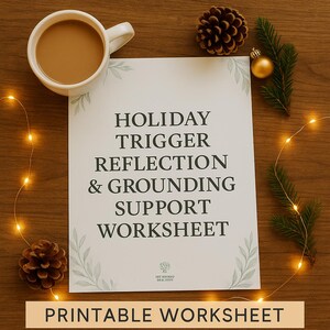 May include: A white mug of coffee is placed near a printed worksheet. The worksheet reads "HOLIDAY TRIGGER REFLECTION & GROUNDING SUPPORT WORKSHEET". The image is decorated with sprigs and pinecones.