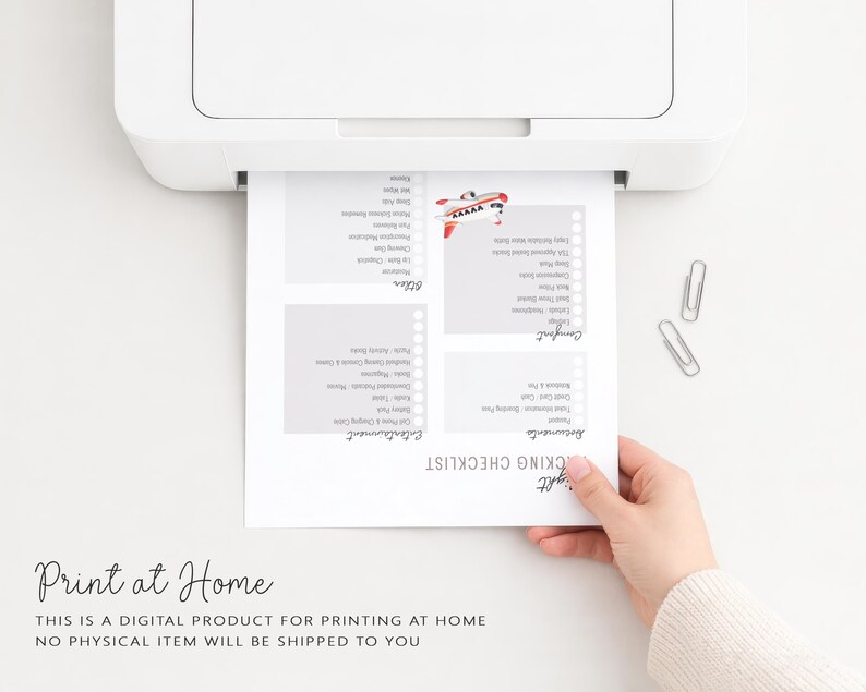 May include: A white sheet of paper with a printed packing checklist is emerging from a white printer. The checklist includes sections for documents, comfort, entertainment, and other items. The text "Print at Home" is visible.