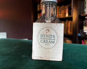 Botella antigua de crema de miel y almendras Hinds, de cristal vintage para tocador, decoración de baño de boticario, botella publicitaria
