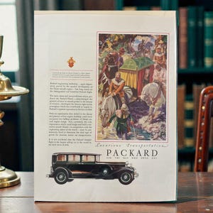 May include: A vintage magazine advertisement for Packard automobiles. The ad features a black Packard car illustration and a colorful illustration of people on horseback. Text includes "Luxurious Transportation" and "Ask the man who owns one."