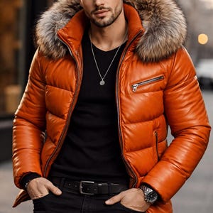 May include: An orange puffer jacket with a fur-trimmed hood. The jacket has a zipper closure and is worn with a black shirt and black jeans. A silver necklace and watch are visible.