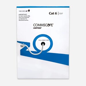 May include: White and blue CommScope Uniprise Cat 6 cable box. The box has the text "THIS SIDE UP" and "IMPORTANT: for best results, ship, store and dispense as indicated by directional arrow." A blue circle indicates where to pull the cable.