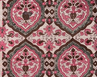 May include: A detailed view of a fabric with a repeating floral design. The pattern showcases pink, brown, and grey floral motifs set against a cream backdrop. The design incorporates stylized flowers, paisley shapes, and geometric elements, offering a vintage feel.