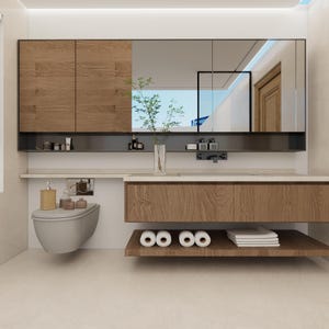 May include: A modern bathroom vanity set featuring a wall-mounted wooden cabinet with a large mirror, a floating wooden countertop with a lower storage shelf, a wall-hung gray toilet, and a glass vase with greenery placed on the counter.