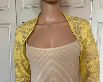 Yellow lace three-quarter length sleeved bolero/shrug/jacket  with satin edging