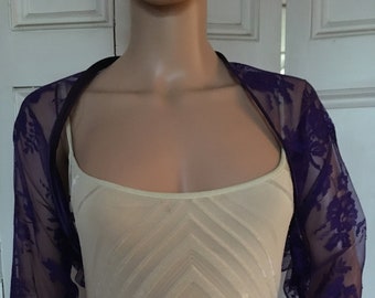 Purple lace three-quarter length sleeved bolero/shrug/jacket  with satin edging