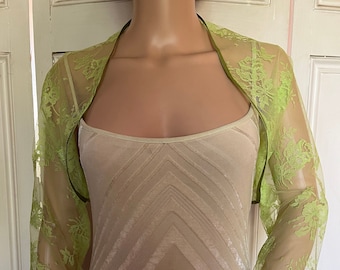 Lime green lace three-quarter length sleeved bolero/shrug/jacket  with satin edging