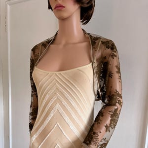 Bronze/warm brown lace three-quarter length sleeved bolero/shrug/jacket with taupe satin edging