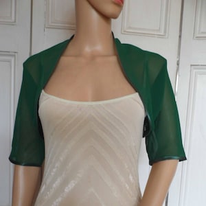 Elbow sleeve shrug outlet