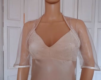 Ivory  organza  elbow length sleeved bolero/shrug/jacket  with satin edging