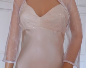 White organza three quarter length sleeved bolero/shrug/jacket  with satin edging