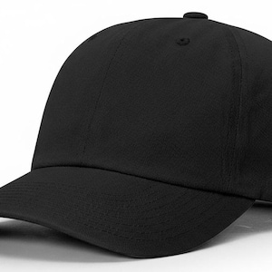 May include: A solid black baseball cap with a curved brim. The cap has a six-panel design with a button on top and adjustable strap. This classic hat is suitable for various casual outfits.