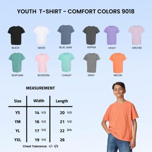 May include: A Comfort Colors 9018 youth t-shirt color chart displaying eleven options: black, white, blue jean, pepper, violet, orchid, seafoam, blossom, chalky, gray, and melon. A measurement table lists sizes YS to YXL with widths and lengths in inches.