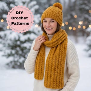 May include: A mustard yellow crochet beanie with a pom-pom and a matching ribbed crochet scarf worn over a cream-colored sweater. A pink circular badge in the upper left corner features the text DIY Crochet Patterns in black lettering.
