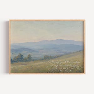 May include: A framed landscape print featuring a serene mountain scene in soft blues and greens. The artwork includes the text "I lift up my eyes to the mountains, my help comes from the Lord. Psalm 121:1-2" in a delicate script.