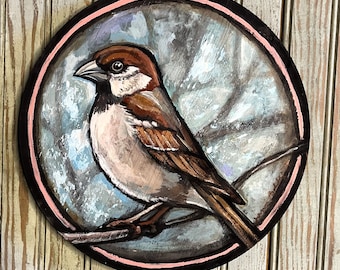 Sparrow on round board