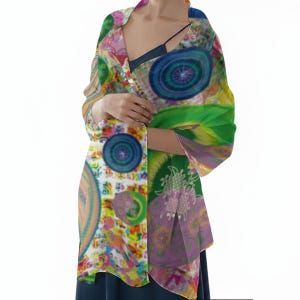 May include: A lightweight scarf featuring a vibrant, multicoloured abstract print with prominent circular motifs in shades of blue, green, pink, and yellow. The fabric displays a complex pattern of geometric shapes and layered textures across the surface.