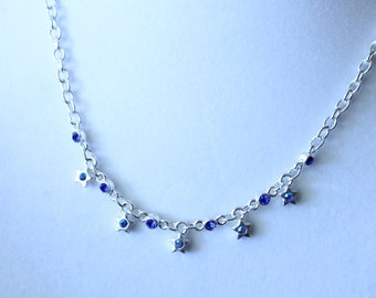 Pretty Silver Tone With Stars and Blue Crystals Necklace