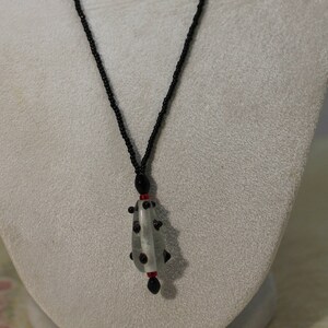 Interesting Black Seed Bead Necklace With Black and White Teardrop Bead at Center