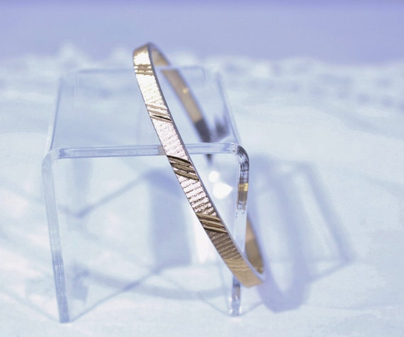 Nice MONET Gold Tone With Etched Loop Bangle Brac… - image 1