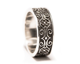 Swril floral pattern wedding band in sterling silver