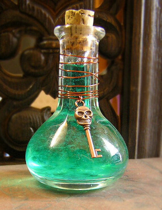 Items similar to Aqua Elixir Glass Potion Bottle on Etsy