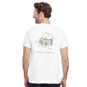 May include: White t-shirt with a graphic of a house and German text. The house illustration is in black and yellow with arrows pointing to different parts of the house. The text "Weniger ist mehr - außer beim Horror" is below the house.