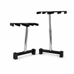 May include: Two adjustable display stands featuring black rectangular bases and top crossbars with three slots each. The vertical supports are made of polished chrome metal, allowing for height adjustment to accommodate different display needs.