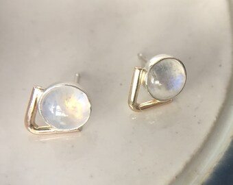 rainbow moonstone earrings in sterling silver with 14k gold fill details, arrow chevron arc rise minimal studs