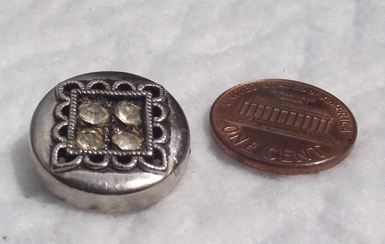 Vintage silver toned rhinestone button UNK16.11-25.37 ornate sq lace like frame,4 sunken rhinestones 1X 0.75ins unusual Round flat top