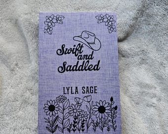 Swift and Saddled de Lyla Sage - Reencuadernado personalizado