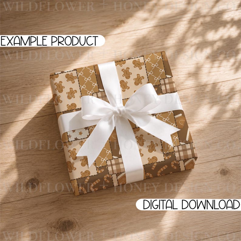 May include: A square gift box wrapped in brown and beige patterned paper featuring gingerbread men, candy canes, stars, and plaid squares, tied with a wide white satin ribbon bow. The text EXAMPLE PRODUCT and DIGITAL DOWNLOAD are visible.