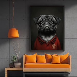 May include: A framed print featuring a black pug wearing a red polo shirt. The artwork is displayed above an orange sofa with matching cushions. The room has a modern design with concrete walls and an orange pendant light.