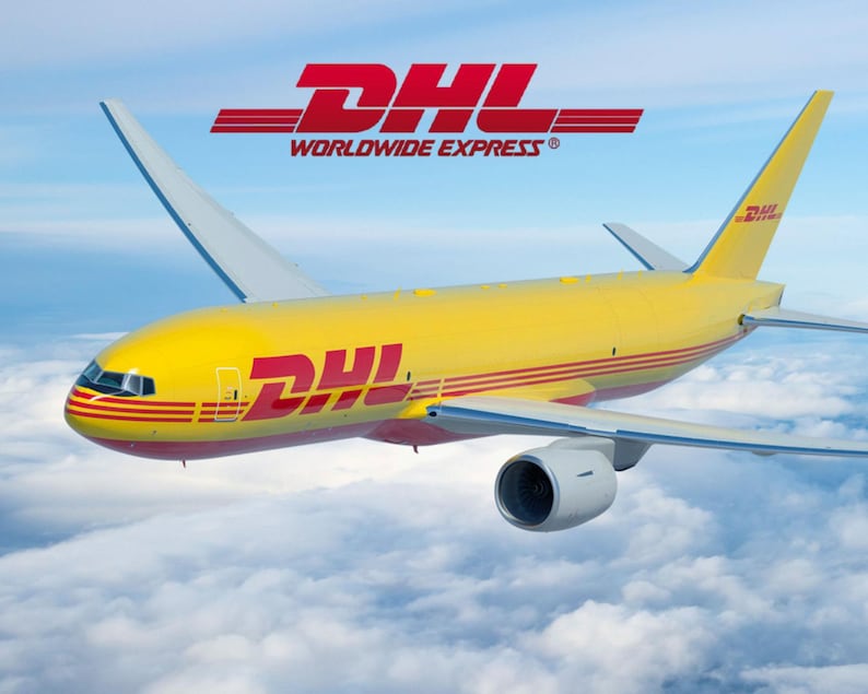 May include: A yellow DHL cargo airplane flies through a cloudy sky. The plane has red and yellow stripes and the DHL logo on the side and top. The text "WORLDWIDE EXPRESS" is above the plane.