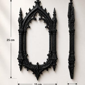 May include: A black frame with pointed arches and intricate spire details. The frame measures 9.84 inches in height, 5.12 inches in width, and 0.98 inches in depth. The design features vertical columns and decorative finials along the edges.
